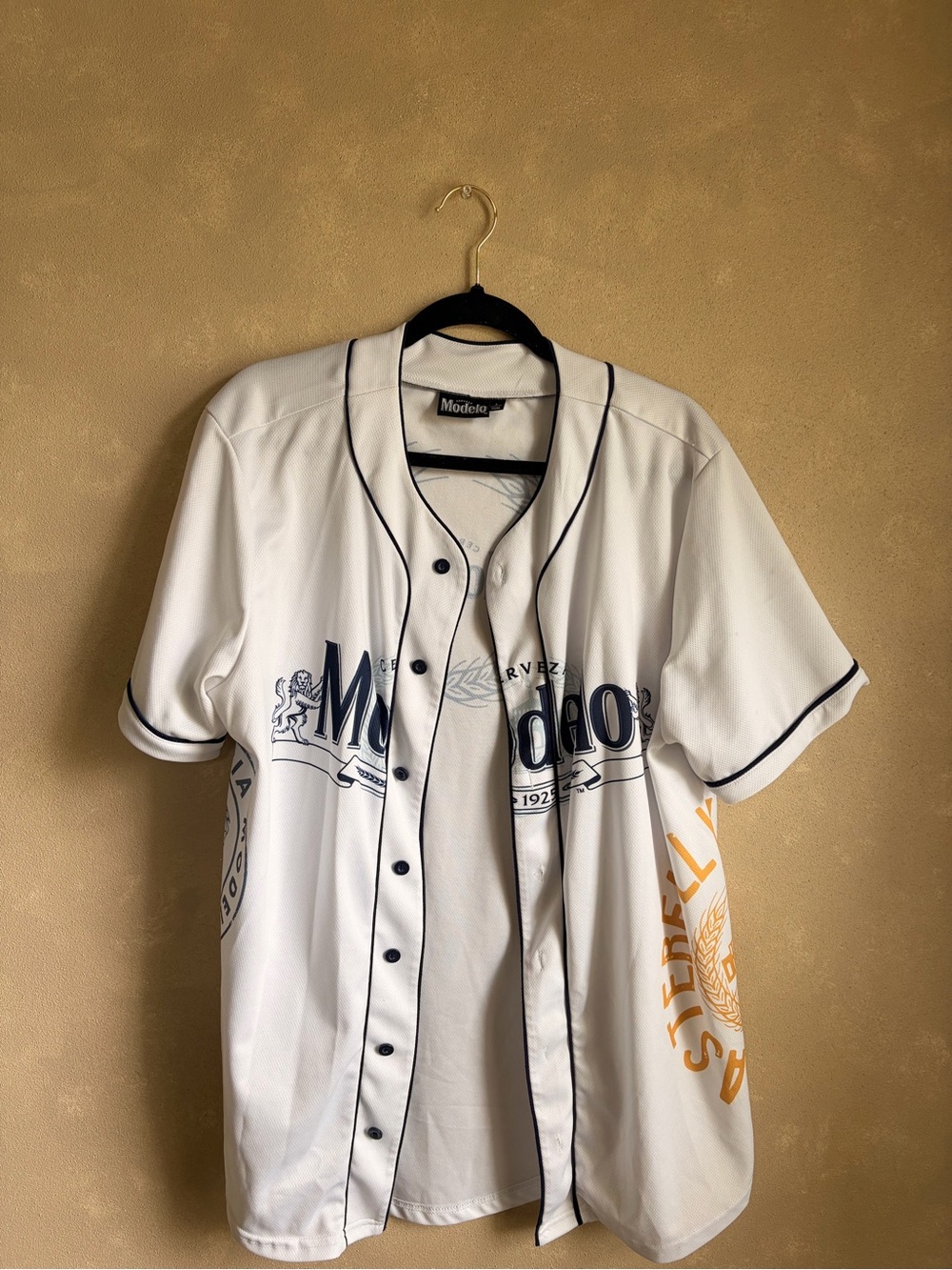 Modelo White Baseball Jersey with Navy and Gold Accents
